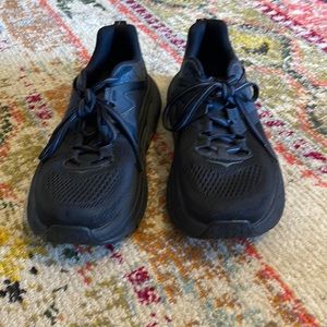 Black Hoka running shoes